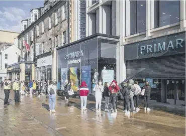  ?? PICTURE: JANE BARLOW/PA ?? 0 The flagship Edinburgh store saw queues form when it reopened in June
