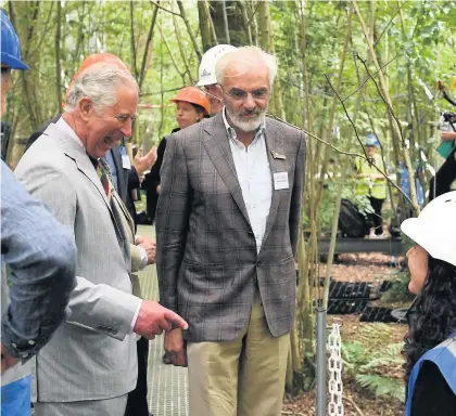  ??  ?? > The Prince of Wales during his visit to the University of Birmingham’s Institute of Forest Research