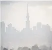  ?? Photo / Michael Craig ?? Auckland could get thundersto­rms today.