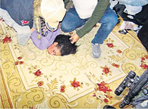  ?? ?? Istanbul’s police detain Ahlam Albashir, above and left, the main suspect behind the explosion who said she was trained by Kurdish militants