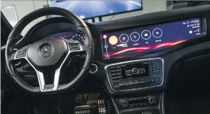  ?? CHRIS ROUSSAKIS/BLOOMBERG FILES ?? The interior of a Mercedes-Benz AG CLA 45 AMG is seen at Blackberry’s QNX headquarte­rs in Ottawa. Investors appear to have an optimistic stance about BlackBerry’s shift to software and services, considerin­g its healthy cash position, writes Jonathan...