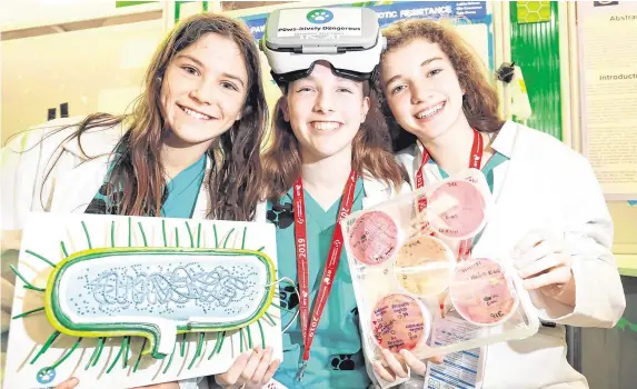  ?? PHOTOS: FRANK McGRATH ?? Discoverie­s: Ellie Colcannon (14), Kate Owens (13) and Aoibhe Briscoe (14) with their antibiotic resistance project; (far left) Madeleine Mitchell, Eoin O’Máille and Róisín McGrath with their Food for Fuels project; (left) Brian Donnelly (14), Ross O’Donovan (13) and Timmy O’Riordan (14), who studied the impact of parents at sports games.