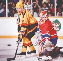  ?? FILES ?? Tony Tanti, seen here in action against Patrick Roy and the Montreal Canadiens on Jan. 1, 1989, started a floor contractin­g business after hockey, Tanti Interiors. He’s been at it for 20 years.