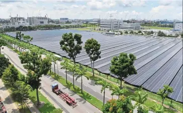  ?? — Bloomberg ?? Under fire: The Sembcorp Tuas solar farm in Singapore. Sembcorp has sold two coal-fired power plants to an Omani group for Us$1.5bil (Rm7.1bil).