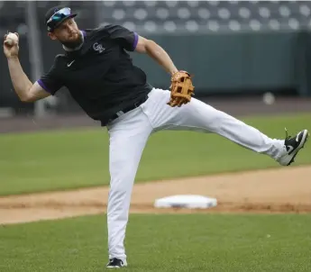  ?? David Zalubowski, The Associated Press ?? Chris Owings is most comfortabl­e at second base but says he will play wherever the Rockies need him this season.