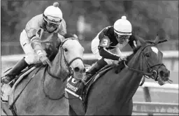  ?? KIM PRATT ?? Red Ruby (left), shown winning the Grade 2 Black-Eyed Susan in May at Pimlico, is sidelined with an injured splint bone.