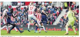  ??  ?? HEAD BOY: Harry Kane was eventually credited with this goal against Stoke