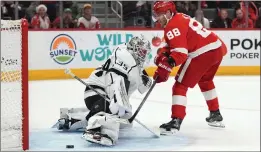  ?? PAUL SANCYA — THE ASSOCIATED PRESS ?? Patrick Kane of the Red Wings scores past Kings goalie Cam Talbot in the second period.