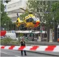  ?? AFP ?? Ein Rettungshu­bschrauber landet auf dem Kudamm.