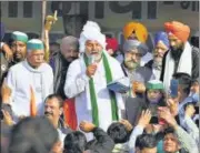  ?? PTI ?? BKU spokespers­on Rakesh Tikait (centre) during the protest against the new farm laws at Ghazipur border on Sunday.