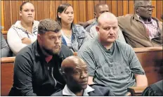  ??  ?? ALLEGED KINGPIN: Julian Brown, 30, and Eugene ‘Boesman’ Victor, 31, seated in court