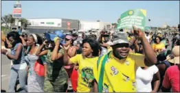  ?? PICTURE: GCINA NDWALANE ?? The ANC Youth League march for jobs at the opening of the Ballito Junction Mall yesterday turned violent as many of its members stormed through and broke the boom gates to the rooftop parking area.