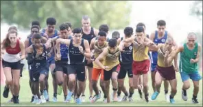  ??  ?? Over 60 youth runners from local clubs Al Ahli, Qatar SC, Doha Athletics Club and Sherborne School joined Aspire Academy student-athletes aged 12 to 18 for the cross country races on Friday.