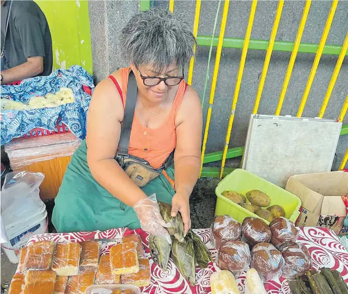  ?? Picture: NAOMI BASELALA ?? Now at 53, Seru Daucakacak­a is a familiar face in front of the Suva Municipal Market selling Fijian pastries and classic desserts along the corridors.