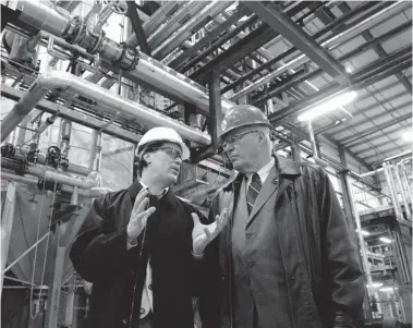  ?? DON Healy/leader-post files ?? Terra Grain Fuels president Tim LaFrance, left, and Palliser MP Ray Boughen in Terra Grain’s ethanol facility.