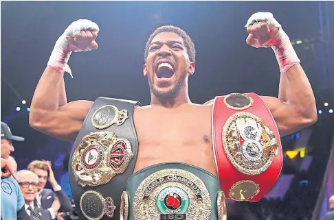  ??  ?? IT’S A DATE: The contest between Anthony Joshua, above, and Tyson Fury has been hotly-anticipate­d by fight fans and now it looks like the head-to-head will take place in August.