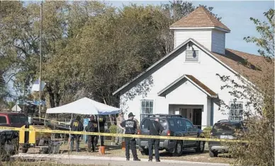  ?? PHOTOS BY NICK WAGNER/ AUSTIN AMERICAN-STATESMAN ?? Law enforcemen­t officials investigat­e at the First Baptist Church in Sutherland Springs, Texas, 30 miles southeast of San Antonio.