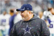  ?? The Associated Press ?? ■ Dallas Cowboys head coach Mike McCarthy smiles as he walks off the field after his team’s NFL game against the Carolina Panthers in Arlington, Texas, Sunday.