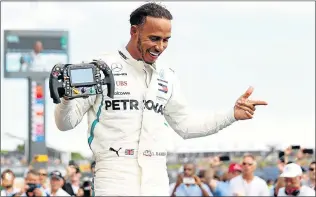  ?? Picture: GETTY IMAGES ?? PODIUM MASTER: Race winner Lewis Hamilton of Great Britain and Mercedes GP celebrates in parc fermé during the Formula One Grand Prix of France at Circuit Paul Ricard on Sunday in Le Castellet, France