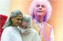  ?? ?? Bollywood actress Jaya Bachchan (left) consoles Manorma Sharma, widow of legendary Indian composer and santoor player Pandit Shivkumar Sharma.