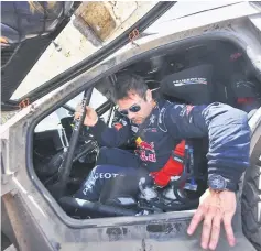  ??  ?? Peugeot’s French driver Sebastien Loeb leaves his car at the end of the Stage 2 of the Dakar Rally between Resistenci­a and San Miguel de Tucuman, in Tucuman, Argentina in this Jan 3 file photo. — AFP photo