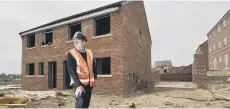  ??  ?? Site Manager Chris Smart at he properties at Keepmoat.182107a