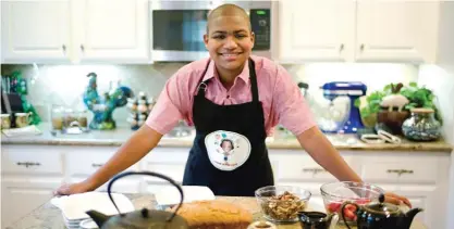  ??  ?? Irvine, California: 13-year-old chef Chase Bailey poses for photos in the kitchen in Irvine. — AP photos