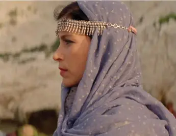  ??  ?? Crista Alfaiate plays fabled storytelle­r Scheheraza­de in Miguel Gomes’ ponderous trilogy, Arabian Nights.