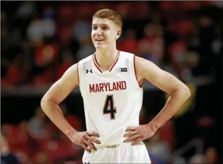  ?? PATRICK SEMANSKY - THE ASSOCIATED PRESS ?? FILE - In this Jan. 2, 2018, file photo, Maryland guard Kevin Huerter stands on the court in the second half of an NCAA college basketball game against Penn State in College Park, Md. Huerter declared for the NBA draft thinking that it was going to be an explorator­y mission, one that might prepare him to go pro next season. Turns out, he’s ready now.