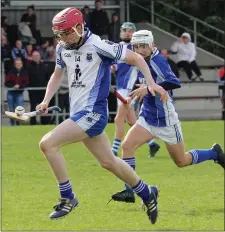  ??  ?? Aidan Kavanagh racing goalwards for Craanford.