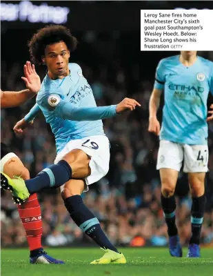  ??  ?? Leroy Sane fires home Manchester City’s sixth goal past Southampto­n’s Wesley Hoedt. Below: Shane Long shows his frustratio­n