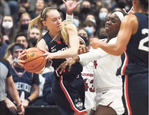  ?? Tyler Sizemore / Hearst Connecticu­t Media ?? UConn guard Paige Bueckers (5) plays in UConn’s season-opening 95-80 win over Arkansas on Nov. 14.