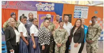  ?? ?? Vice Principal Bridgette Pancho, 2LT Jhanene Morgan, Sergeant Witter and Constable Clunis, President Aneskia, Directors and Members of OCK share with Students of the Dunoon Park Technical participat­ing in the Respect for law presentati­on