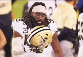  ?? Rich Schultz / Associated Press ?? Saints linebacker Demario Davis helped spearhead his team’s #SAYHERNAME campaign, which points attention to Black women who have been victims of police brutality.