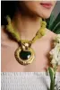  ?? ?? Green agate tulle necklace with hammered brass pendant