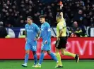  ?? Photograph: Massimo Pinca/ Reuters ?? Pasquale Mazzocchi (left) has his yellow card upgraded to a red by the referee, Maurizio Mariani.