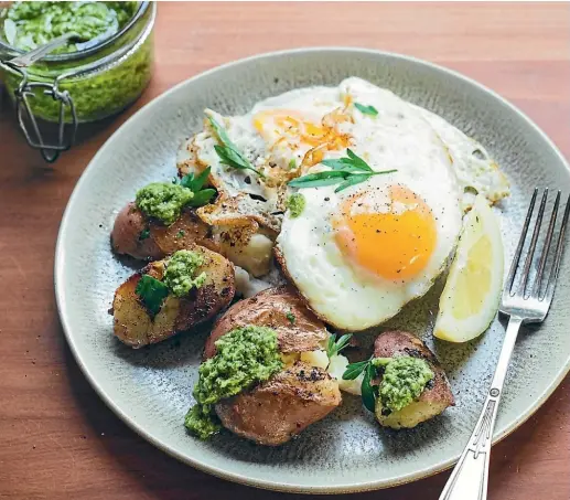  ?? PHOTOS: NICOLA GALLOWAY ?? Roasted smashed potatoes with spring greens sauce feature parboiled potatoes gently smashed, drizzled with a tasty butter of your choice, then roasted until golden and crispy skinned.