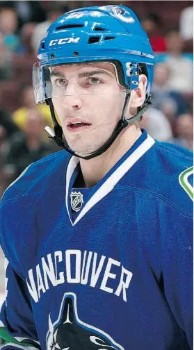  ?? J E F F V I N N I C K /G E T TY I M AG E S ?? Forward Alexandre Burrows is heading into his 10th season with the Vancouver Canucks after signing with the club in 2005.
