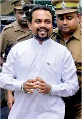  ??  ?? Charges were filed against Wimal Weerawansa and Namal Rajapaksa and they were remanded and released on bail