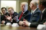  ?? EVAN VUCCI — THE ASSOCIATED PRESS ?? President Donald Trump speaks during a meeting with steel and aluminum executives in the Cabinet Room of the White House on Thursday in Washington. Seated, from left, are Roger Newport of AK Steel, John Ferriola of Nucor, Trump, Dave Burritt of U.S....