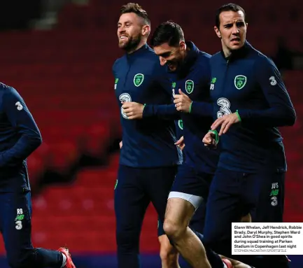  ?? STEPHEN McCARTHY/SPORTSFILE ?? Glenn Whelan, Jeff Hendrick, Robbie Brady, Daryl Murphy, Stephen Ward and John O’Shea in good spirits during squad training at Parken Stadium in Copenhagen last night