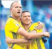  ?? AP ?? Sweden captain Andreas Granqvist (left) is greeted by Marcus Berg after he scored from the penalty against South Korea.