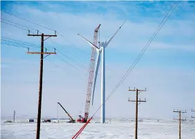  ?? SASKPOWER ?? One of 10 wind turbines being erected near Morse by Algonquin Power & Utilities Corp., is expected to be completed by the end of the month. The Morse project will add
23 megawatts of wind power to SaskPower’s electrical grid.