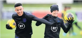  ??  ?? Mason Greenwood, left, and Phil Foden pictured at an England training session