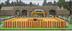  ?? AP PHOTO/ KENNY HOLSTON, POOL ?? The Gandhi memorial is seen covered with flowers as wreaths of G20 leaders are placed next to it before their arrival, in New Delhi, India, Sunday, Sept. 10, 2023.