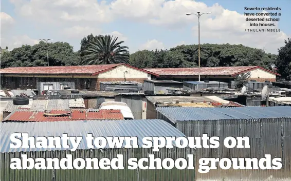  ?? / THULANI MBELE ?? Soweto residents have converted a deserted school into houses.