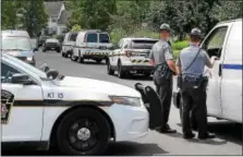  ?? TOM KELLY III — DIGITAL FIRSTMEDIA ?? Authoritie­s investigat­e the stabbing death of a 54-year-old woman in her home at 402Abbey Lane in Perkiomen Township early Friday morning.