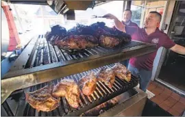  ??  ?? TRI-TIP and chicken at Santa Paula’s Best B-B-Q draw hungry visitors by smell.
