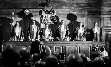  ??  ?? Maraga (third right) and judges stand prior to speaking as the Supreme Court dismissed two petitions to overturn the country’s Oct 26 presidenti­al election re-run, validating the poll victory of Kenyatta. — AFP photo