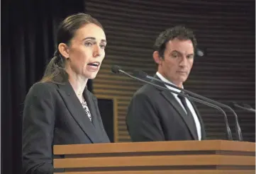  ?? YELIM LEE/ AFP/GETTY IMAGES ?? New Zealand Prime Minister Jacinda Ardern fulfills a pledge to tighten the country’s gun laws. The sale of assault rifles and semiautoma­tic weapons was banned in response to last week’s mass shooting at mosques in Christchur­ch.